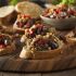Crostini saborizados com caponata de legumes