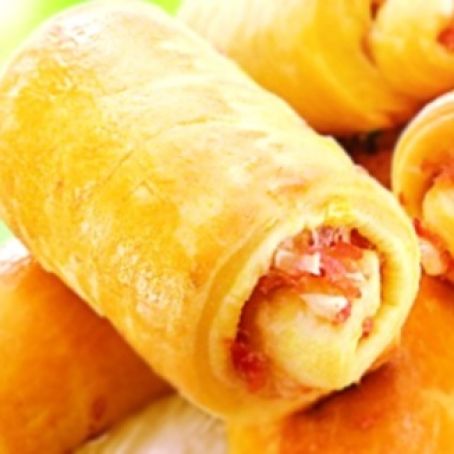 ENROLADINHO DE MILHO COM PRESUNTO E QUEIJO