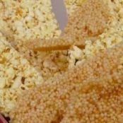 canhao de pipoca doce