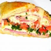 Enrolado de presunto e queijo