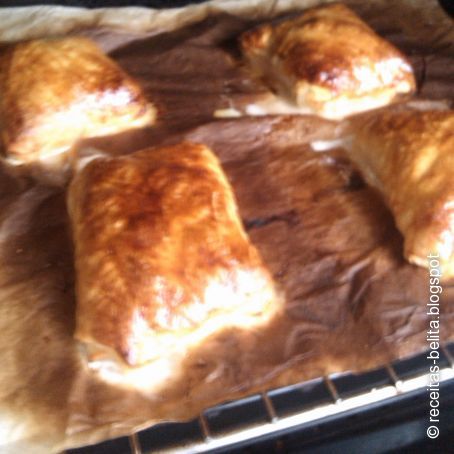 Lombos de peixe recheados com mortadela de azeitonas e queijo com massa folhada