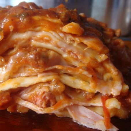 Lasanha com molho branco e bolonhesa