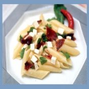 Penne com Tomate Seco e Rúcula