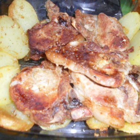 Bistecas de Porco com batatas assadas em laminas