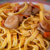 Saint-Jacques flambéed with smoked salmon